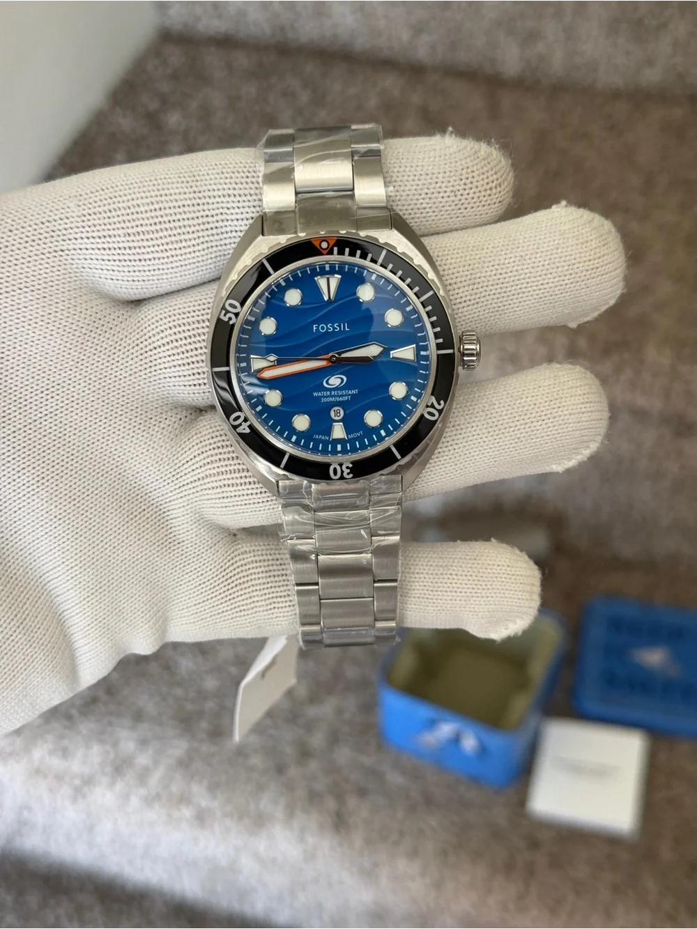Fossil Men’s Blue Wave Dial Stainless Steel Swim Watch with Black Bezel